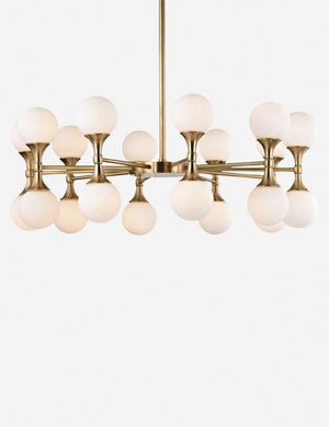 Abernathy gold wheel-like chandelier with dual-light fixtures