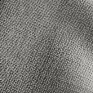 Detailed shot of the gray linen on the Adara gray linen upholstered bed.
