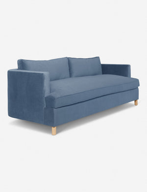 Angled view of the Harbor Blue Velvet Belmont Sofa