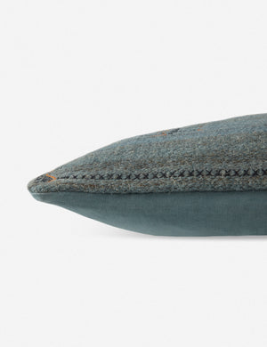 Side view of the Indigo woven cotton boho and folk-inspired lumbar pillow with a wool front