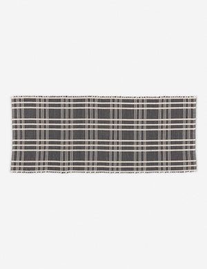 Rika black and white cotton machine washable mat with checkerboard pattern in its runner size